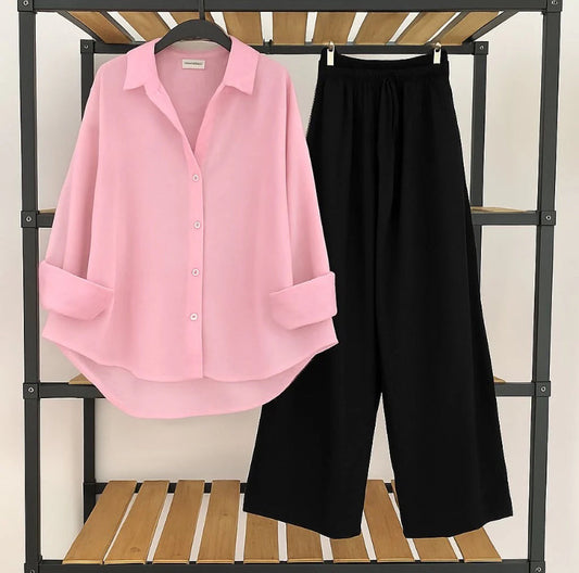 Pink button down shirt with black flapper Trouser